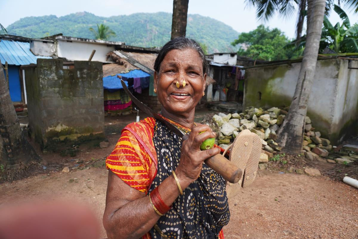 The Savara tribal woman returns from the forest after a long day of fieldwork