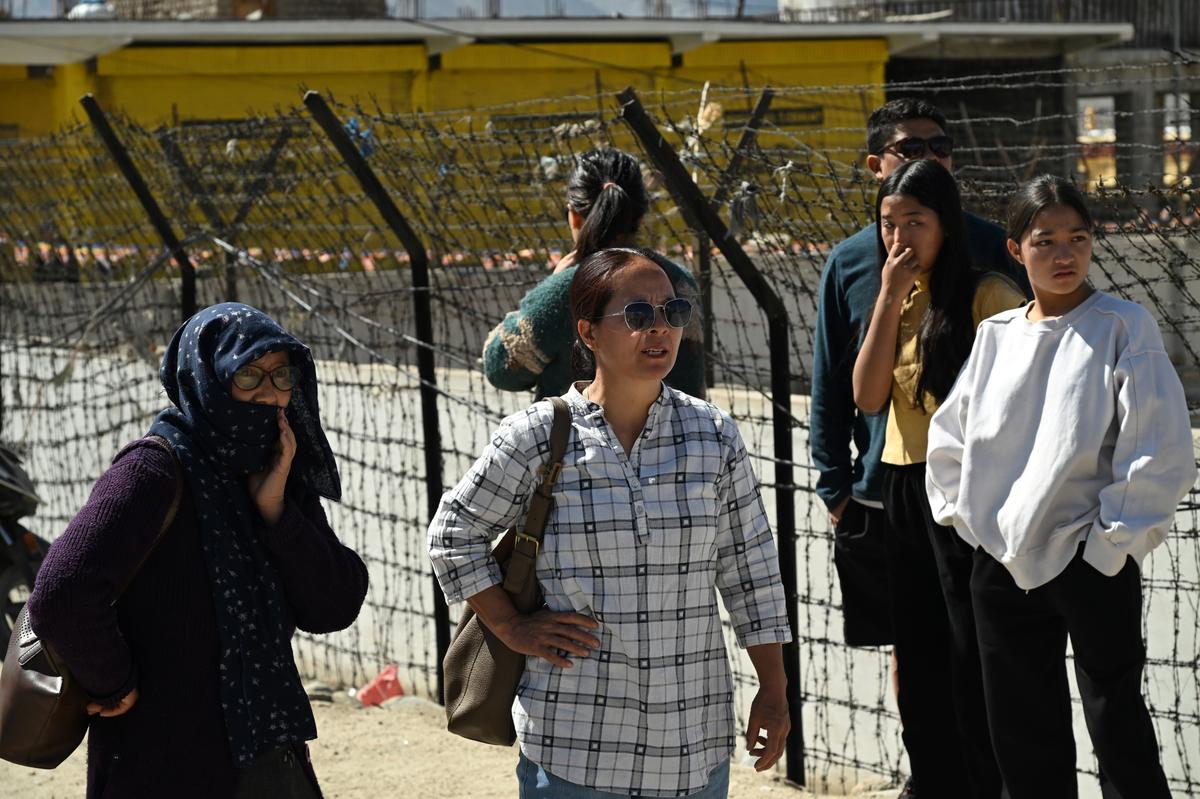 Relatives waiting oustide the district jail in Leh. Twenty-six people were arrested following the violence on September 24. 