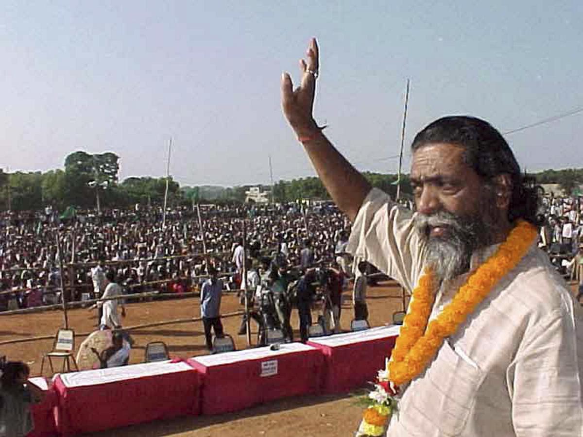 In this Oct. 22, 2000 file photo, Jharkhand Mukti Morcha leader Shibu Soren at a rally, in Ranchi. 