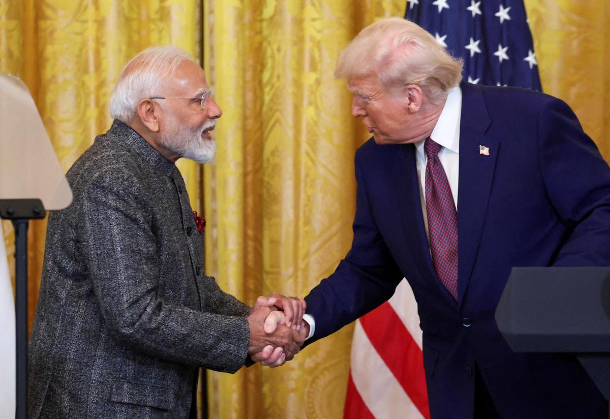 Mr. Modi and Mr. Trump shake hands as they attend a joint press conference at the White House in Washington, D.C., U.S., on February 13, 2025.