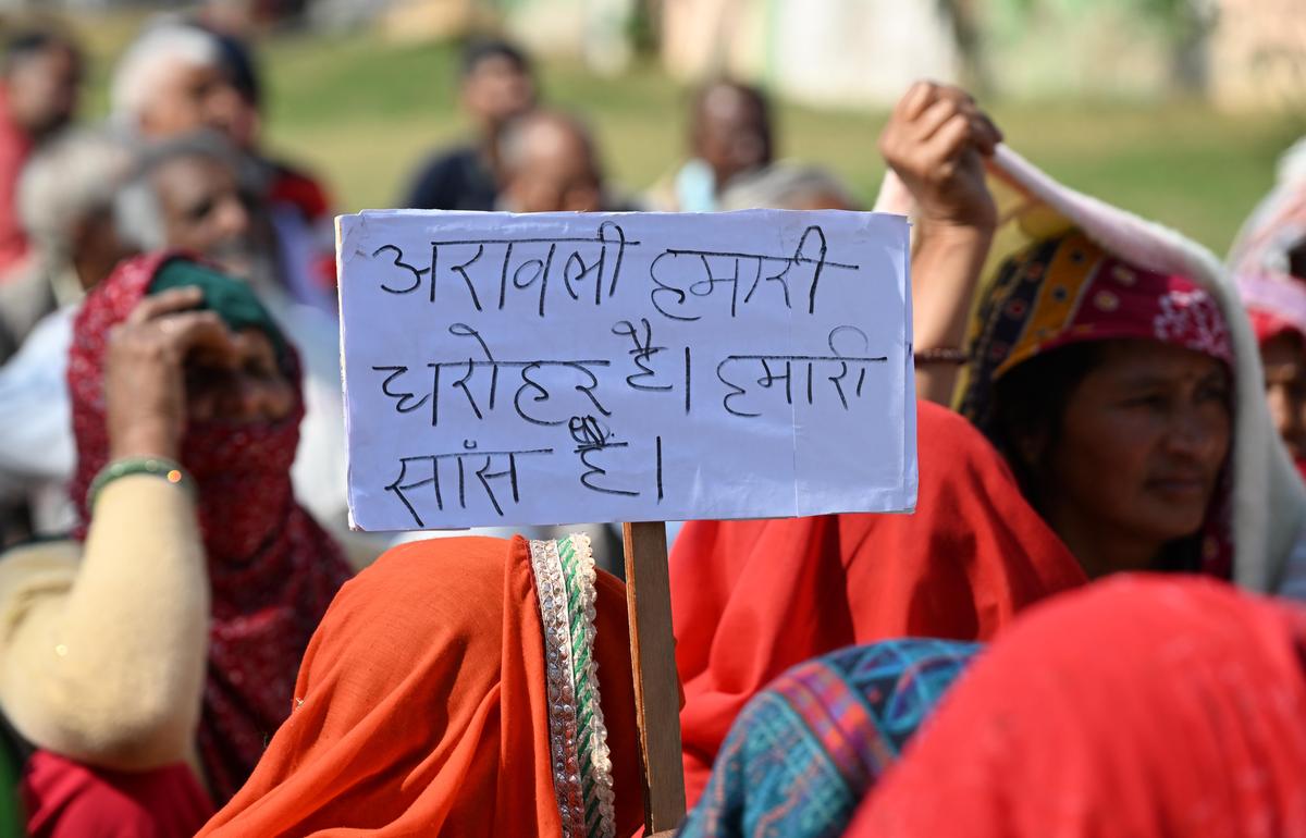 A protest at Kotputli in Rajasthan. The poster reads, “The Aravallis are our heritage and our breath.” A protest at Kotputli in Rajasthan. The poster reads, “The Aravallis are our heritage and our breath.”