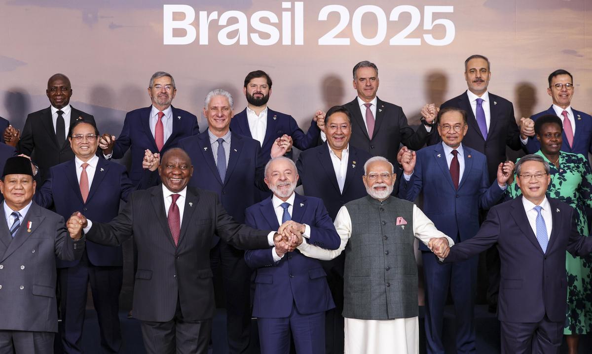 Mr. Modi addressed the BRICS Summit when in Brazil and said that India will prioritise issues of the Global South, during its presidency of the group in 2026. In this image via PMO on July 7, 2025, Mr. Modi, Brazil's President Luiz Inacio Lula da Silva and South Africa's President Cyril Ramaphosa during a group photograph with BRICS members, partners and outreach invitees at the BRICS Summit 2025, in Rio de Janeiro, Brazil. Mr. Modi addressed the BRICS Summit when in Brazil and said that India will prioritise issues of the Global South, during its presidency of the group in 2026. In this image via PMO on July 7, 2025, Mr. Modi, Brazil's President Luiz Inacio Lula da Silva and South Africa's President Cyril Ramaphosa during a group photograph with BRICS members, partners and outreach invitees at the BRICS Summit 2025, in Rio de Janeiro, Brazil.