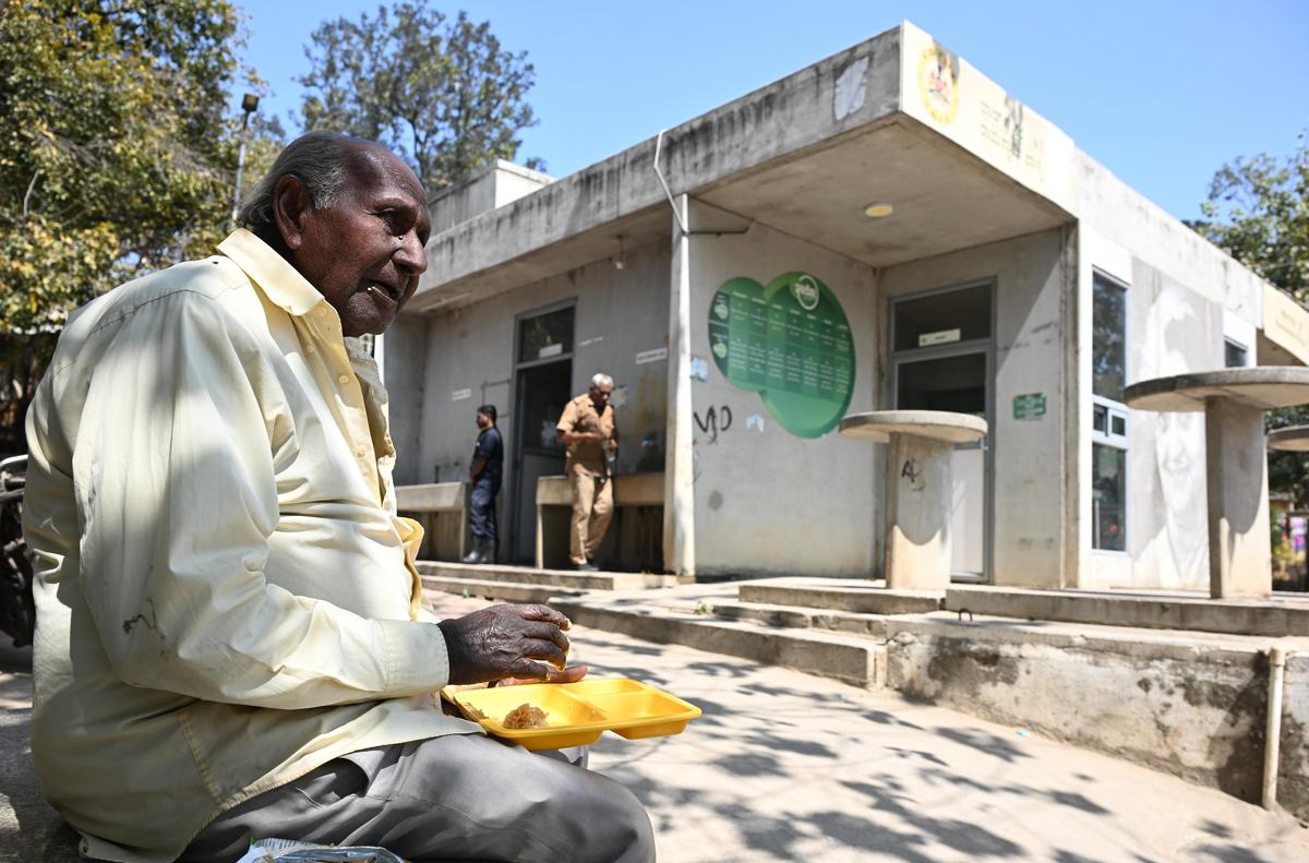 An elderly man having a meal at the Indira Canteen in Benson Town, in Bengaluru on February 10, 2026. 
