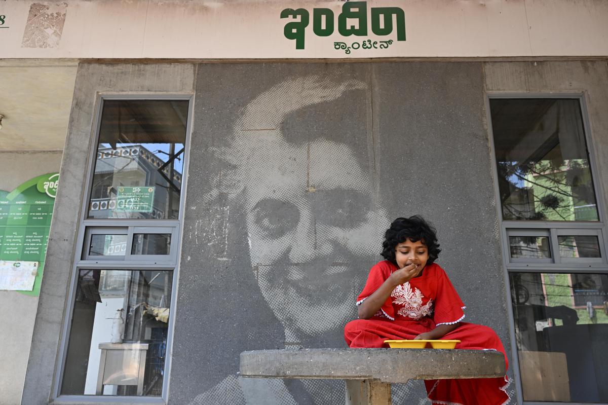A child having a meal at the Indira Canteen near Tannery Road, in Bengaluru on February 10, 2026. 