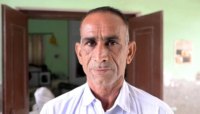 Satyavan ,a cotton farmer at Kirtan Village in Hisar District.
