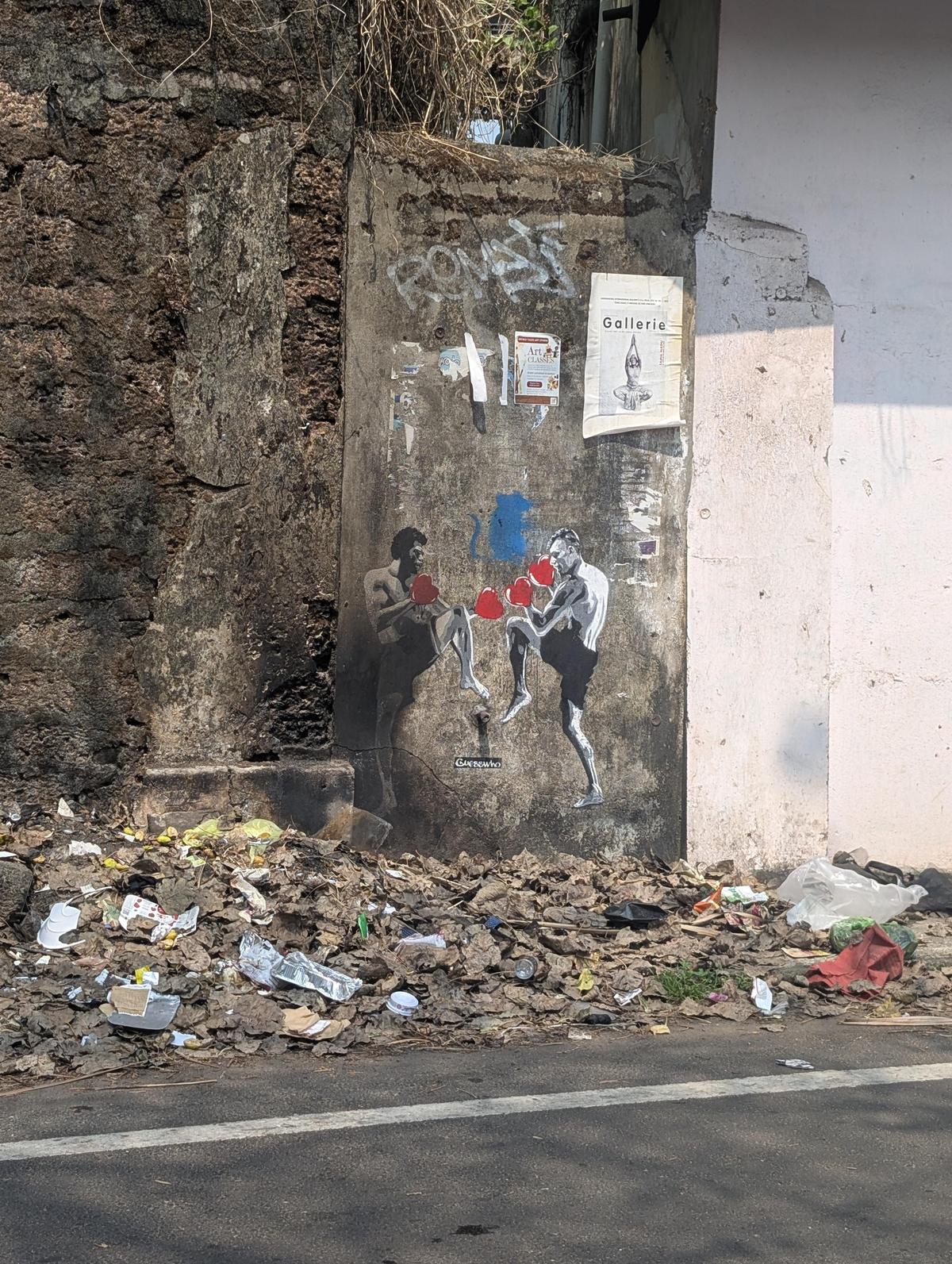 अंदाज़ा लगाओ कि भित्तिचित्र कौन है